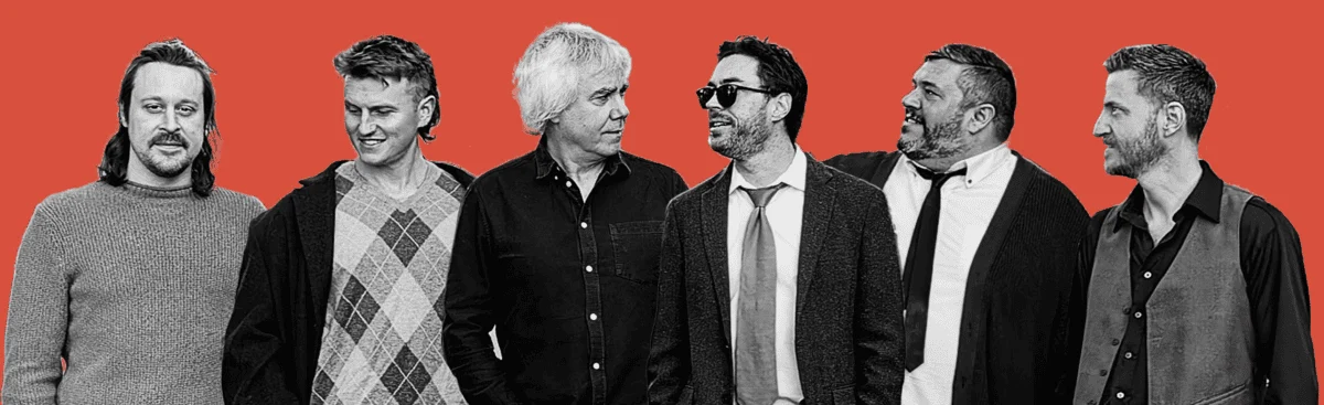 Official venue-provided photograph of the olllam against a red background; not a live Atlanta show photograph.