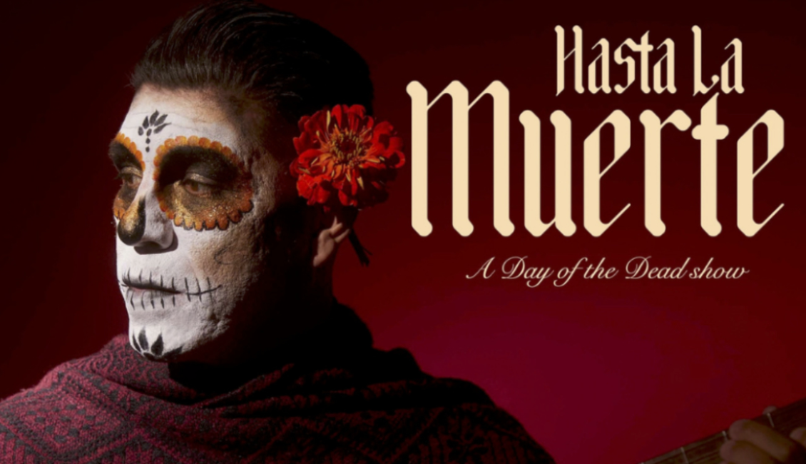 Official Hasta La Muerte program artwork with a performer in skull face paint and a red flower beside the show title.