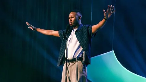 Official artist photograph of Ola Dada performing; not a photograph of the upcoming Houston show.