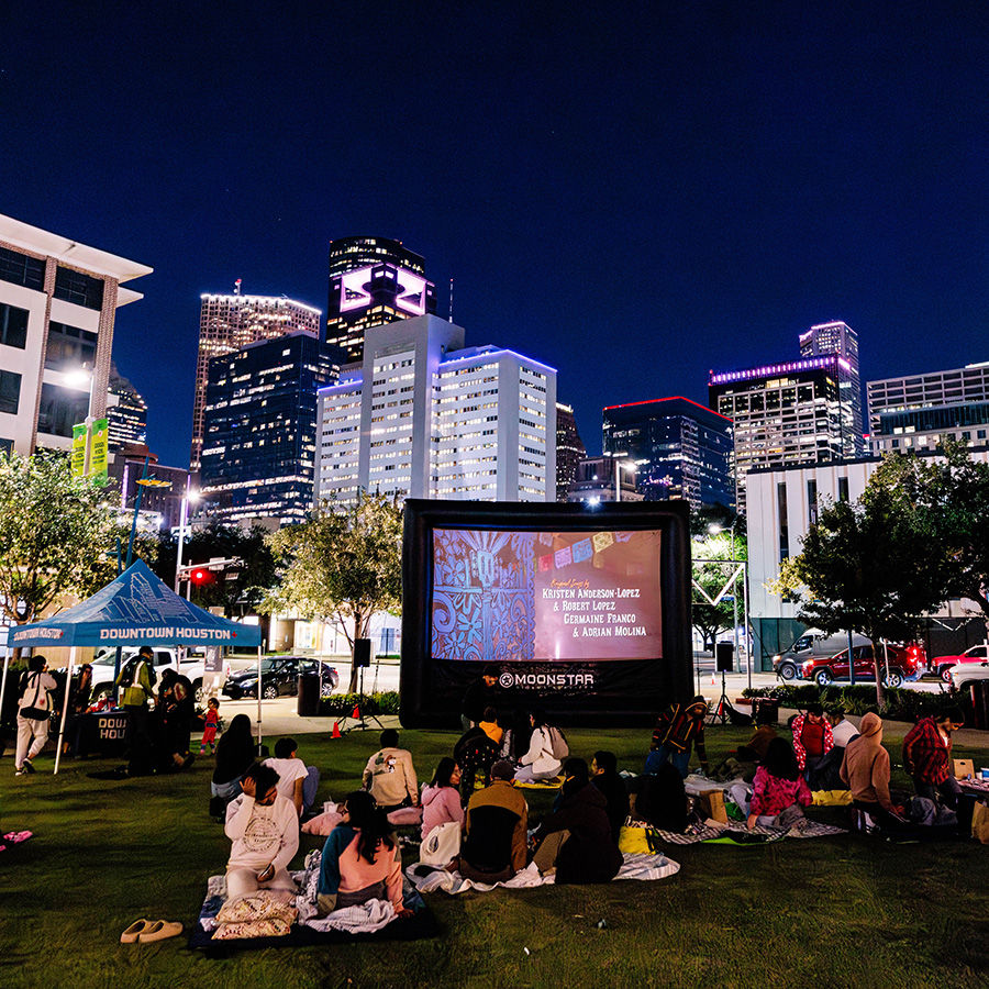 Promotional photograph of an outdoor Coco screening supplied by Downtown Houston; not a dated photograph of the October 30, 2026 event.