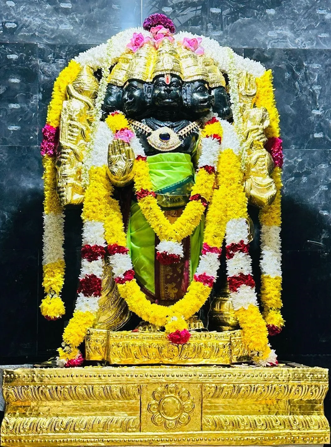 Portrait-format devotional image of Panchamukhi Hanuman used on the temple's event listing.