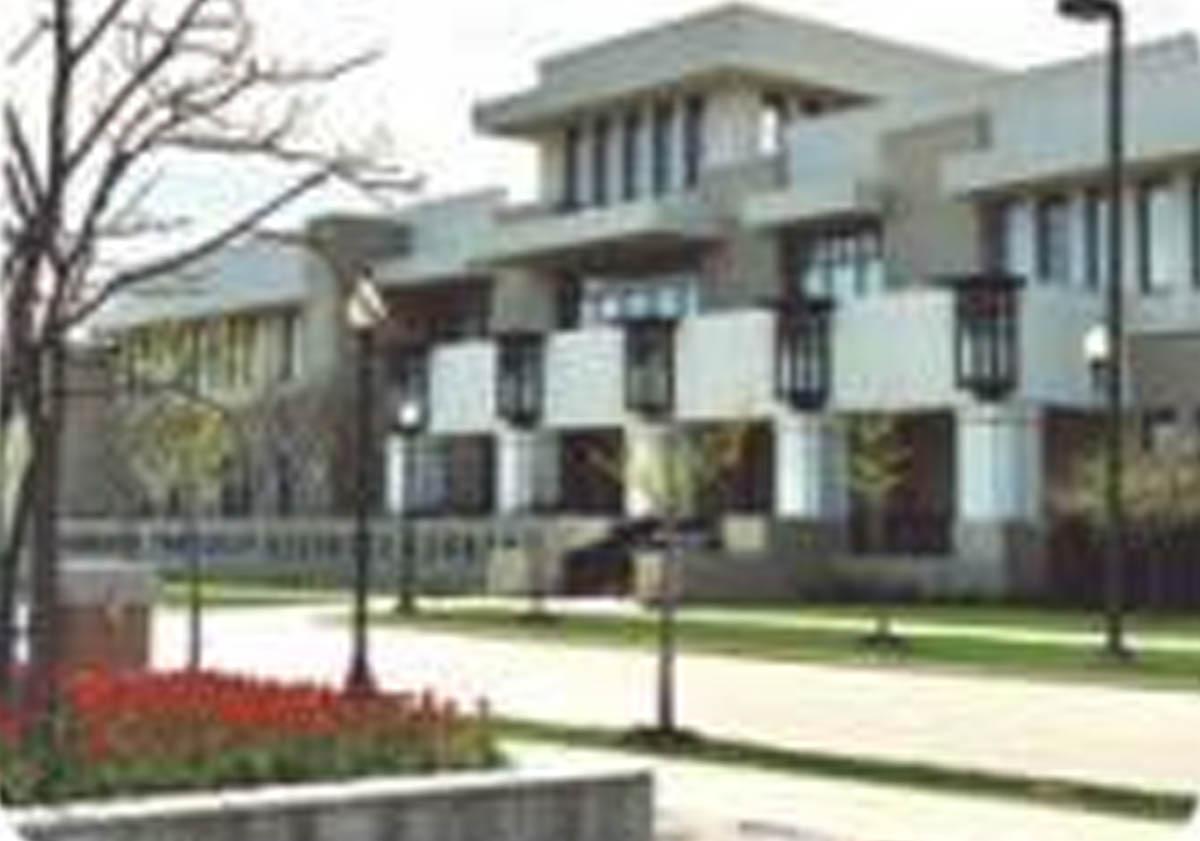 Official venue photograph of Schaumburg Central Library, not an event poster